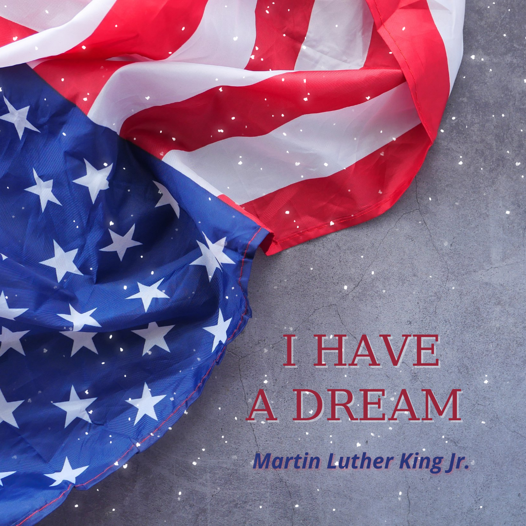 I have a Dream quote by Martin Luther King Jr on a gray background next to American Flag