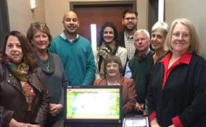 Foundation displaying grant check that was given to them