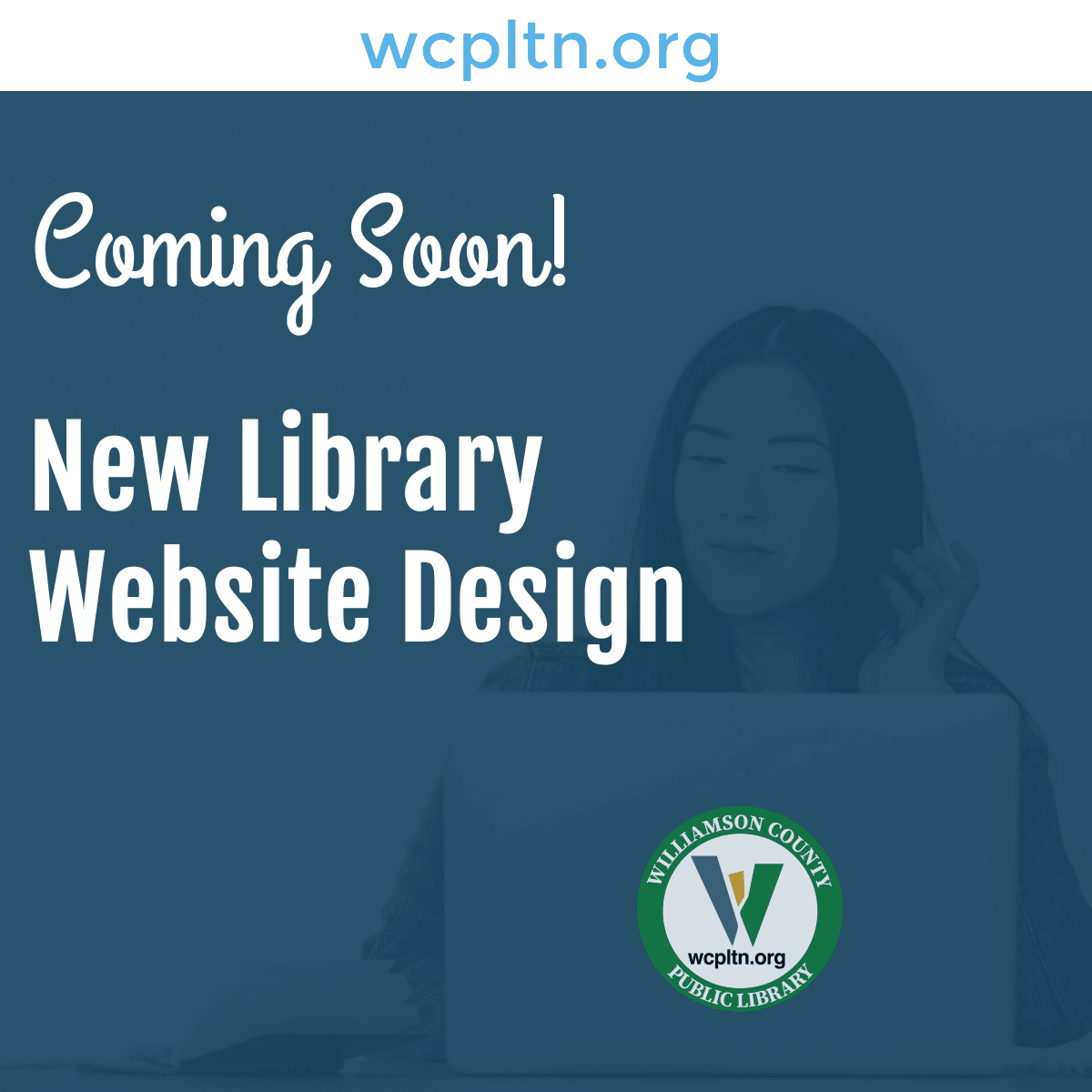 blue background woman looking at laptop