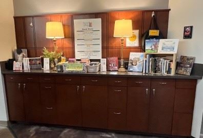friends book sale wall photo with books and items on it